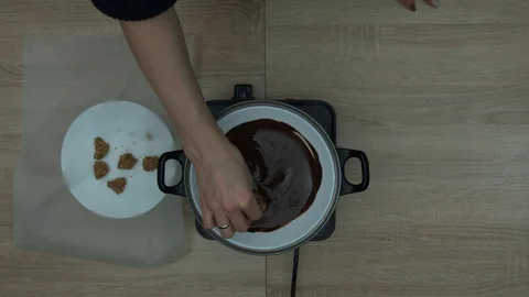 Healthy Pumpkin Snickers Bars Dipping In Hot Chocolate Stock Footage 87504351