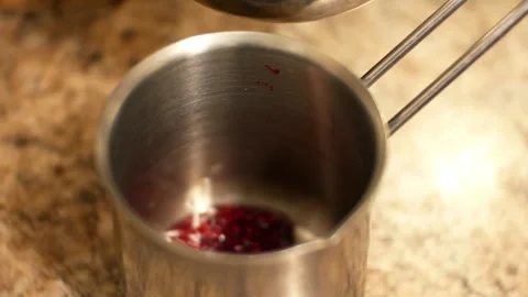 Healthy raspberry tea - raspberry jam is poured with boiling water 動画素材 305595501