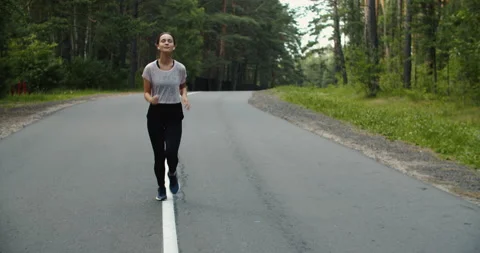 Healthy running runner man workout on road. Jogging female fitness model working Stock Footage 201751165