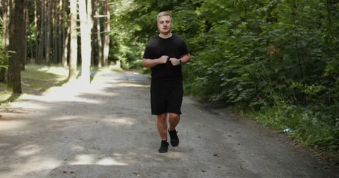 Healthy running runner man workout on road. Jogging male fitness model working Stock Footage 201753769