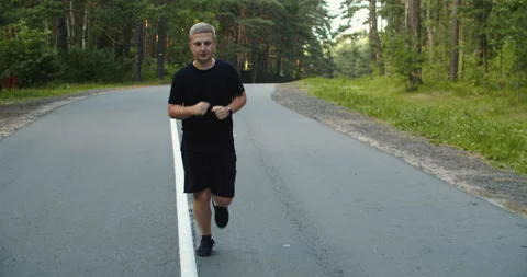Healthy running runner man workout on road. Jogging male fitness model working Stock Footage 201753811
