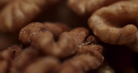 Healthy shelled walnuts rotating on white background Stock Footage 344317542