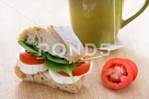 Healthy simple sandwich made of bread, cheese, and spinach Stock Photos