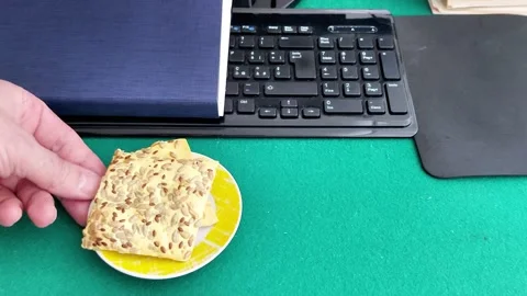 Healthy Snack Break: Seeded Crackers for Energy at the Workspace 스톡 동영상 327775283