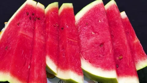 Healthy summer snack featuring fresh watermelon slices rich in hydration Stock Footage 336149017