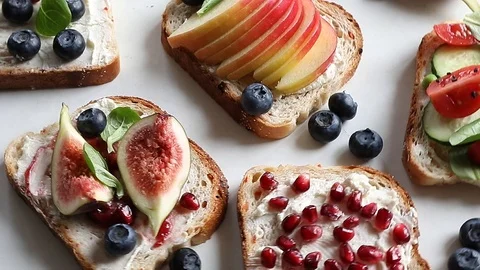 Healthy summer toasts for breakfast Stock Footage 90991198
