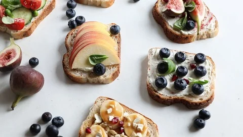 Healthy summer toasts for breakfast Stock Footage 90991202