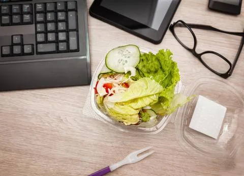 Healthy Vegetable Lunch Box On Working Desk Stock Photos