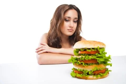 Healthy woman rejecting junk food isolated Stock Photos