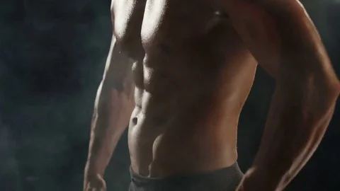 Healthy young man during mass-building shoulder workout with his head not Stock Footage 69234399