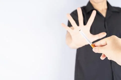 Healthy young man refusing to take cigarette quit of smoking concept. Tobacco Stock Photos