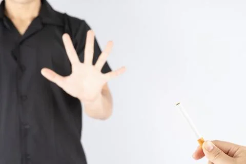 Healthy young man refusing to take cigarette quit of smoking concept. Tobacco Stock Photos