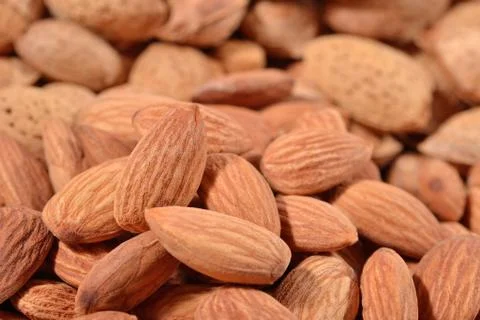 Heap of almonds close up Stock Photos