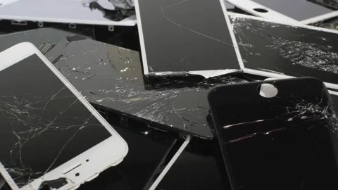 Heap with the Apple iPhone broken screens lying one on top of another.Editorial Stock Footage 211875305