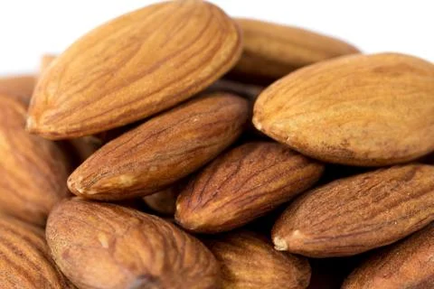 Heap of apricot kernels close up Stock Photos