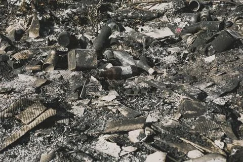Heap of ashes and garbage after a fire in building. Close up view . Copy spac Stock Photos