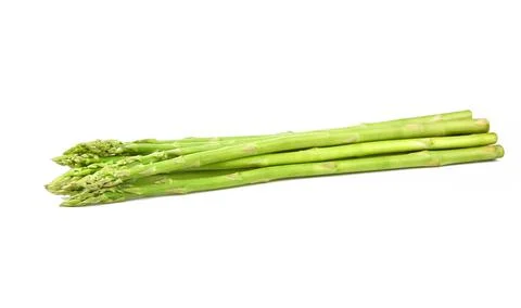 Heap of Asparagus on white background Stock Photos