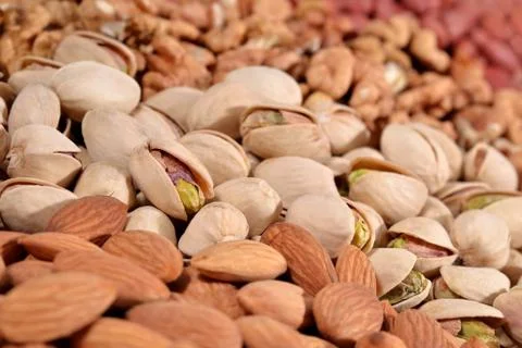 Heap of assorted nuts close up as background Foto stock