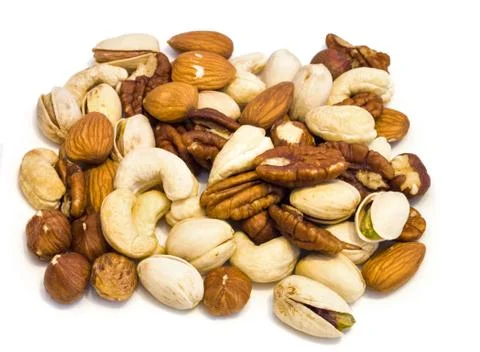 Heap of assorted nuts . Stock Photos