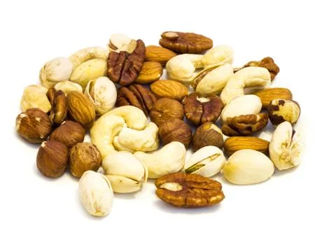 Heap of assorted nuts . Stock Photos