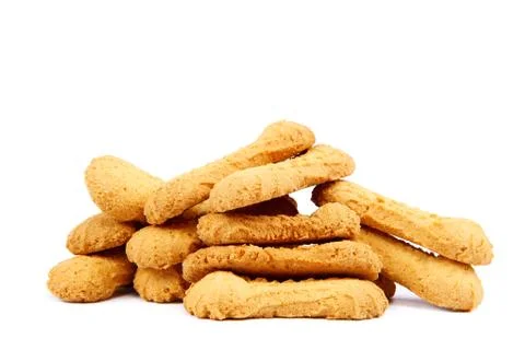Heap of biscuits on white background. Stock Photos