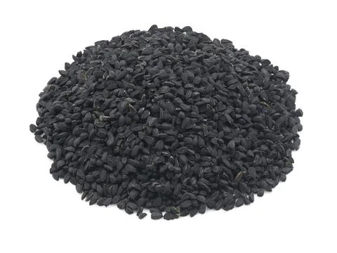 Heap of black cumin seeds Stock Photos