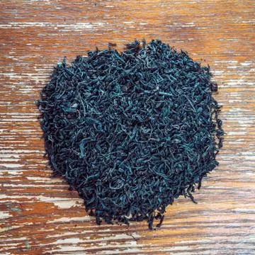 Heap of black leaf tea Stock Photos