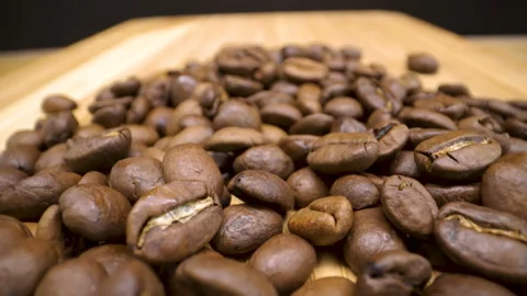 A heap of the black roasted coffee beans Stock Footage 135703791