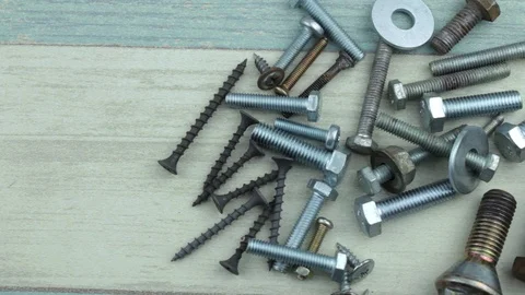 Heap of bolts and self-tapping screws Stock Footage 86465721