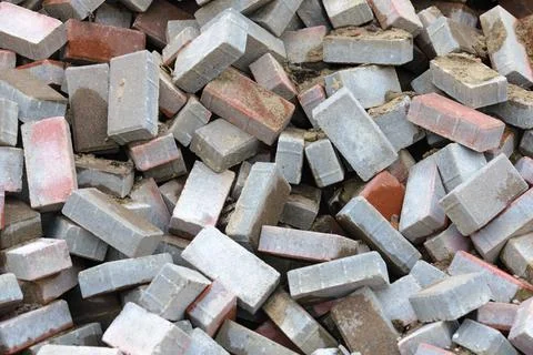 Heap of Bricks A heap of calcium silicate bricks on a construction site Co... Stock Photos
