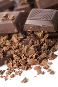 Heap of broken chocolate isolated Stock Photos