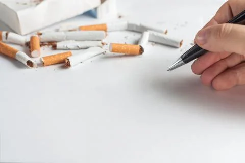 Heap of broken cigarettes Stock Photos
