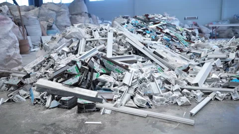 Heap of broken plastic and frames lies with bags of fertilizers Stock Footage 306668163