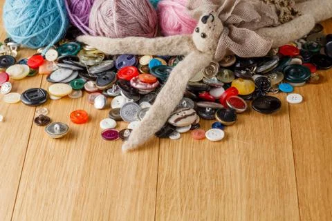Heap of button on wood table Foto stock