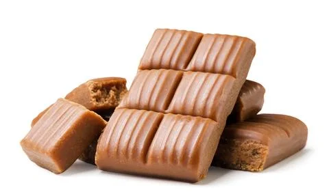 Heap of candy toffee on a white background. Isolated Stock Photos