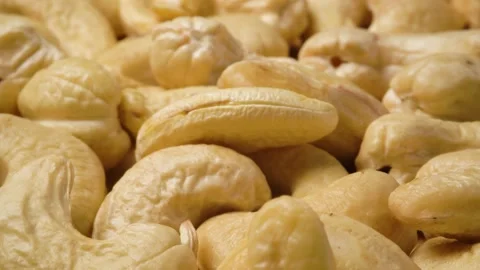 Heap of cashew nuts macro slow panorama Video stock 146146363