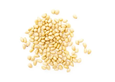 Heap of cedar or pine nuts isolated on white, top view Stock Photos