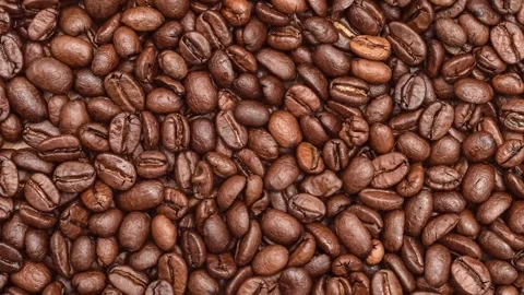Heap of coffee beans grinding Video stock 270126115