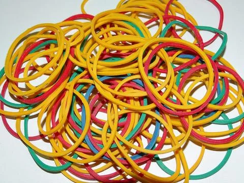 Heap of colored rubber bands 库存照片