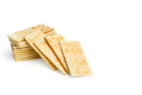 A heap of cracker biscuits on a white background Stock Photos