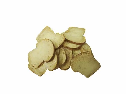 Heap of crispy baked bread chips isolated on white background. Stock Photos
