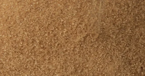 Heap of crystal cane sugar rotating, 4k Stock Footage 105757126