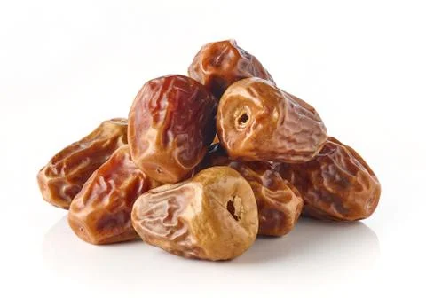 Heap of dates isolated on white background Stock Photos