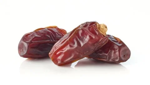 Heap of dates isolated on white Stock Photos