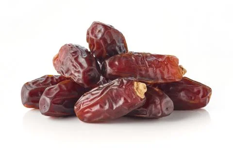 Heap of dates isolated on white Stock Photos