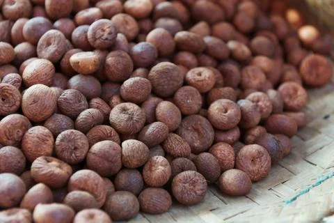 Heap of dry full nutmeg Stock Photos