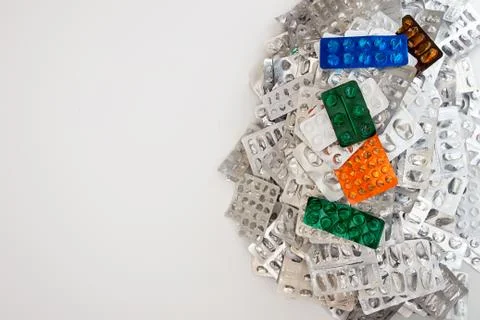 Heap of empty assorted various medicine tablets pills blisters different colo Stock Photos