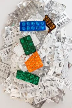 Heap of empty assorted various medicine tablets pills blisters different colo Stock Photos