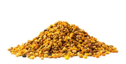Heap of flower pollen close-up on a white. Isolated. Stock Photos