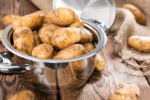 Heap of freh potatoes Stock Photos
